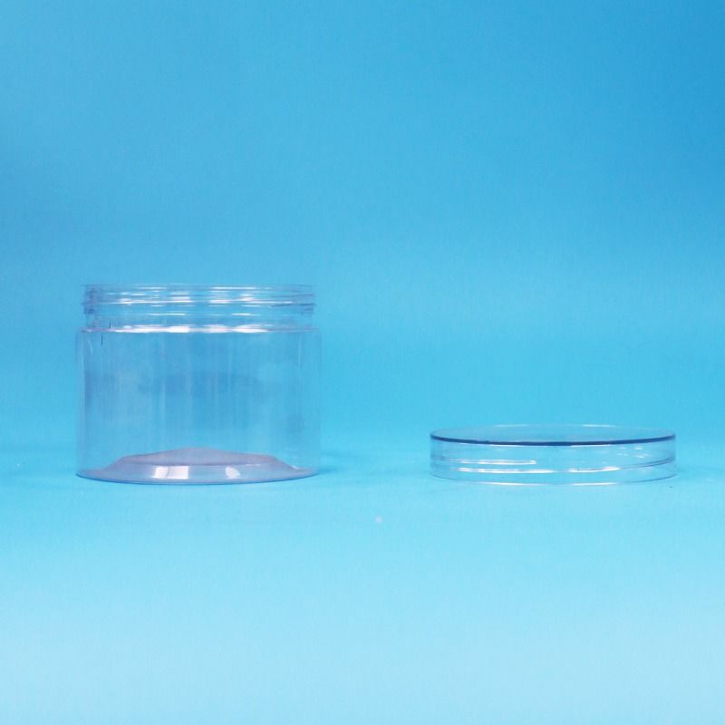 Calidad alimenticia PET transparente plástico alimento seco dulces frutos secos frascos de regalo de nueces tornillo tapas planas