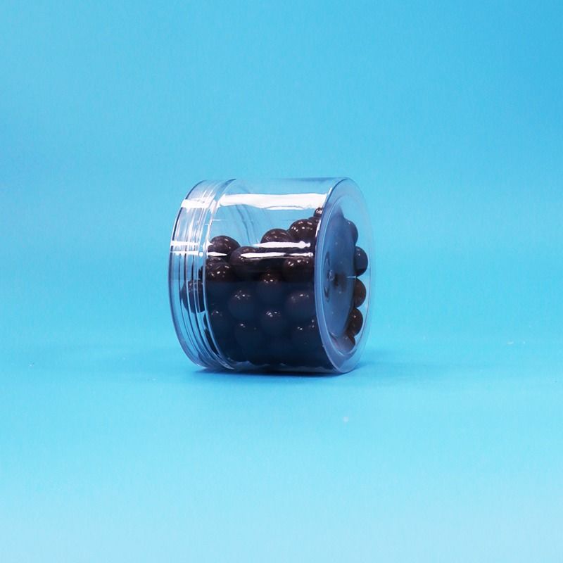 Calidad alimenticia PET transparente plástico alimento seco dulces frutos secos frascos de regalo de nueces tornillo tapas planas
