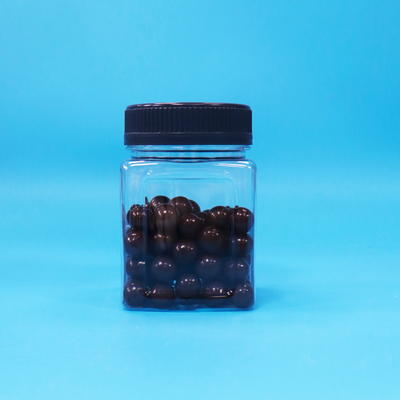Tarro de embalaje de plástico PET transparente hermético cuadrado con agarre para nueces, galletas y caramelos sin BPA