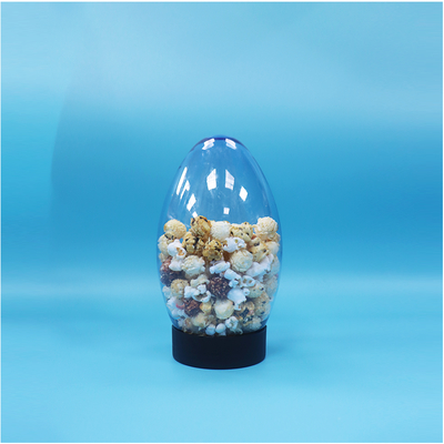Jarrón de caramelos de plástico en forma de huevo en forma de palomitas de maíz de pistacho de nueces de caramelo de cara abajo tapa plana