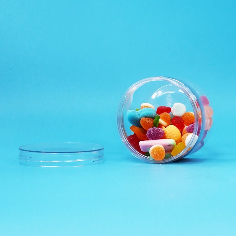 Comida seca de plástico PET transparente dulces galletas nueces frascos de regalo tornillo tapas planas grado alimenticio