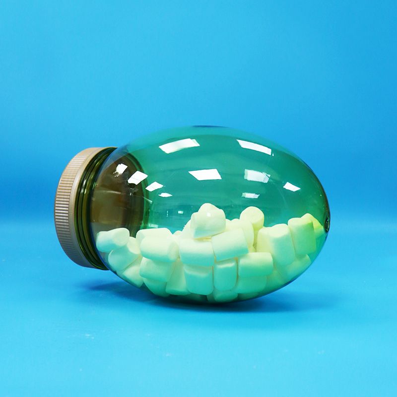 Tarro de plástico transparente PET de forma única para alimentos, grado alimenticio, con tapa plana de rosca para nueces, pistachos y caramelos