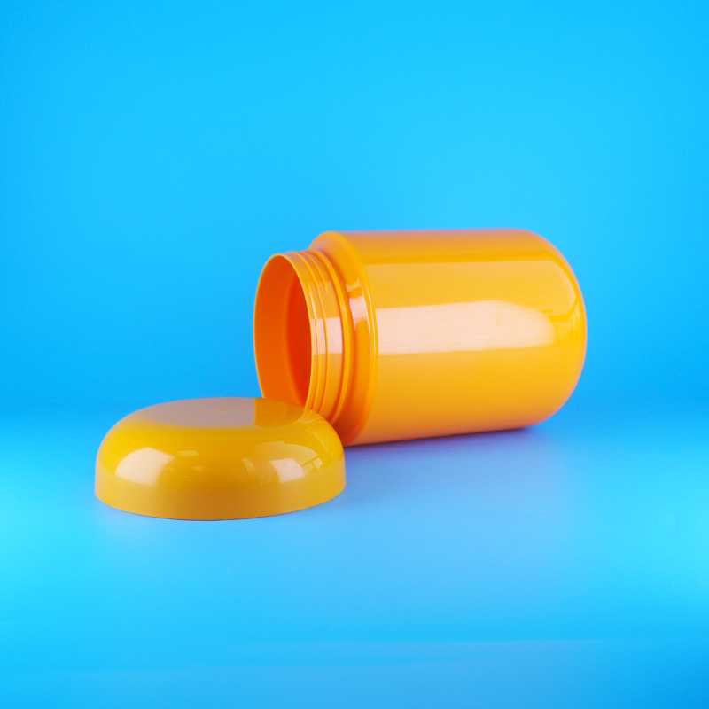 Frascos de galletas y caramelos con tapa plana de rosca de plástico PET naranja de grado alimenticio y forma redonda