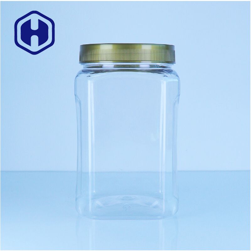 Cuadrado PET Vidrio de plástico transparente de miel con tapa de tornillo de grado alimenticio nueces frutas secas dulces fácil de verter