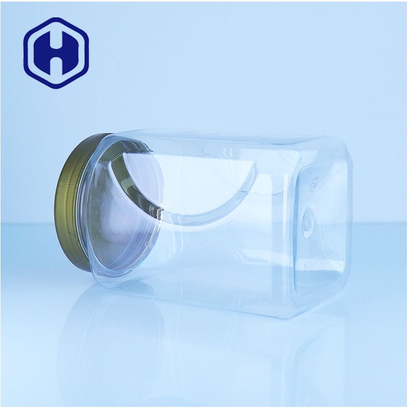 Cuadrado PET Vidrio de plástico transparente de miel con tapa de tornillo de grado alimenticio nueces frutas secas dulces fácil de verter