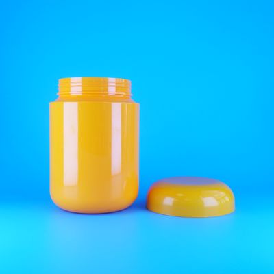 Frascos de galletas y caramelos con tapa plana de rosca de plástico PET naranja de grado alimenticio y forma redonda